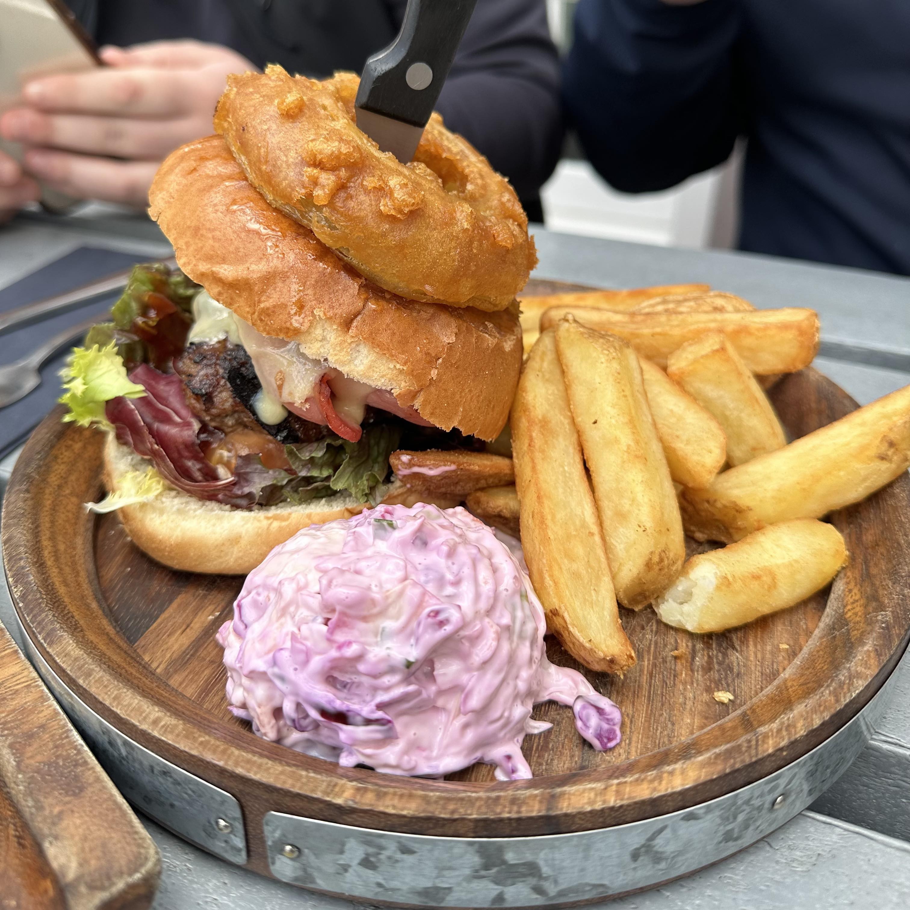 Burger meal with chips and coleslaw at The Bristol Trader